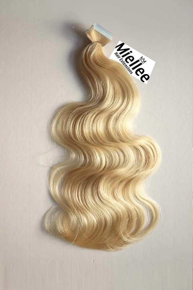 Butter Blonde Seamless Tape Ins - Wavy Hair