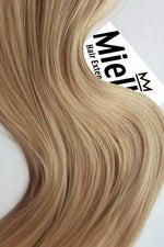 Butterscotch Blonde Seamless Tape Ins - Wavy Hair