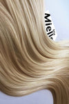 Champagne Blonde 8 Piece Clip Ins - Wavy Hair