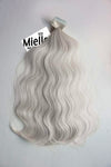 Icy Blonde Seamless Tape Ins - Wavy Hair