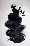 Licorice Black Seamless Tape Ins - Wavy Hair