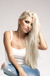 Frosty Blonde Seamless Tape Ins - Wavy Hair
