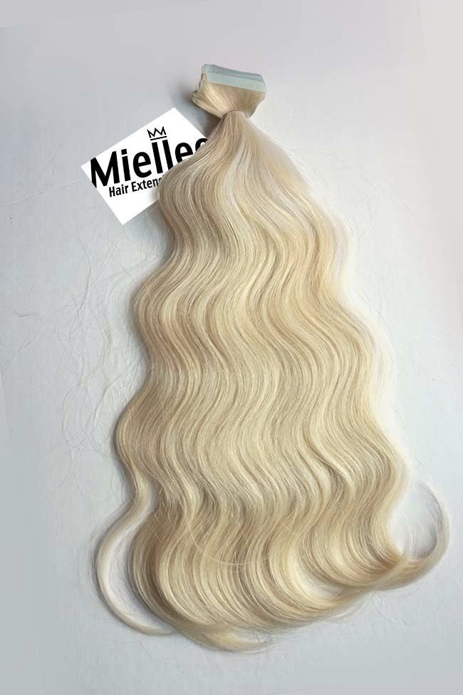 Vanilla Blonde Seamless Tape Ins - Wavy Hair
